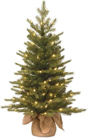 National Tree Company Pre-Lit ‘Feel Real’ Artificial Mini Christmas Tree, Green, Nordic Spruce, White Lights, Includes Burlap Bag Base, 3 Feet